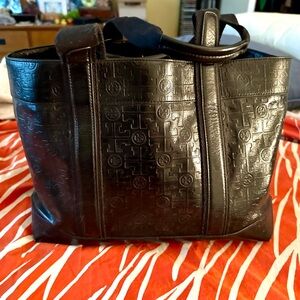Black Tori Burch tote bag.